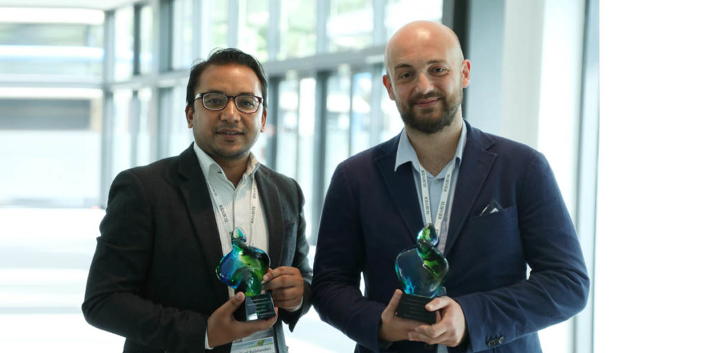 First prize winner Prajwal Rabhindari, President of the Research Institute for Bioscience & Biotechnology (RIBB) in Nepal, and second prize winner Dr. Alessio Adamiano, a researcher at the Italian National Research Council (CNR), pose with their awards